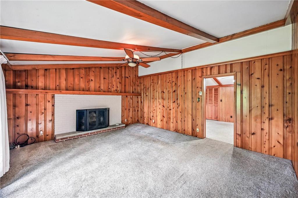 301 Hopper Road Transfer, PA 16154 - Photo 31 of 48 a view of an empty room with a fireplace