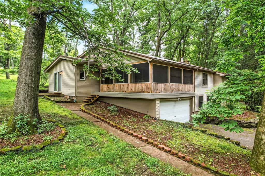 301 Hopper Road Transfer, PA 16154 - Photo 5 of 48 a view of house with backyard and garden