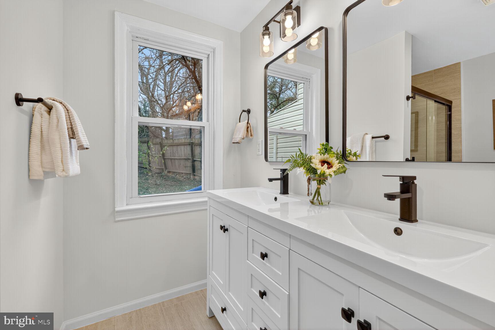 10238 Capitol View Avenue Silver Spring, MD 20910 - Photo 11 of 25 FULLY RENOVATED PRIMARY BATH, DOUBLE SINKS