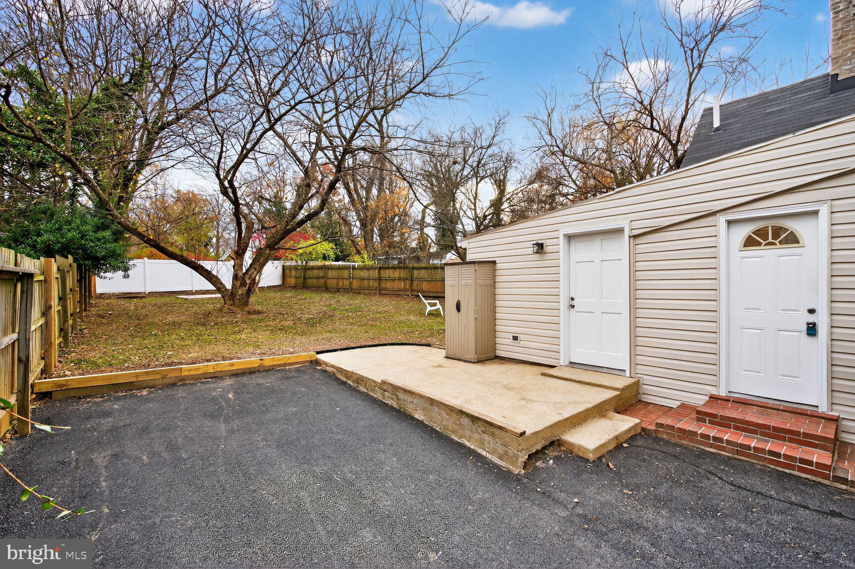 10238 Capitol View Avenue Silver Spring, MD 20910 - Photo 16 of 25 PATIO, IDEAL FOR A GRILL, NEW PAVED DRIVEWAY