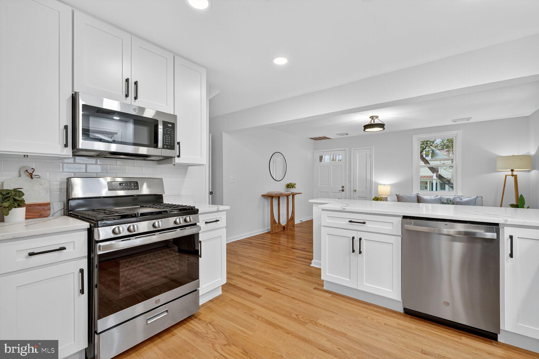 10238 Capitol View Avenue Silver Spring, MD 20910 - Photo 6 of 25 NEW STAINLESS APPLIANCES AND ADDED HARDWOOD FLOORS