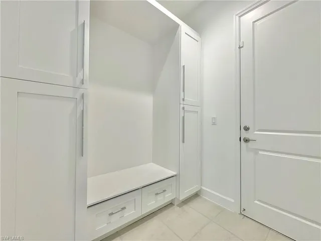 a bathroom with a tub and shower