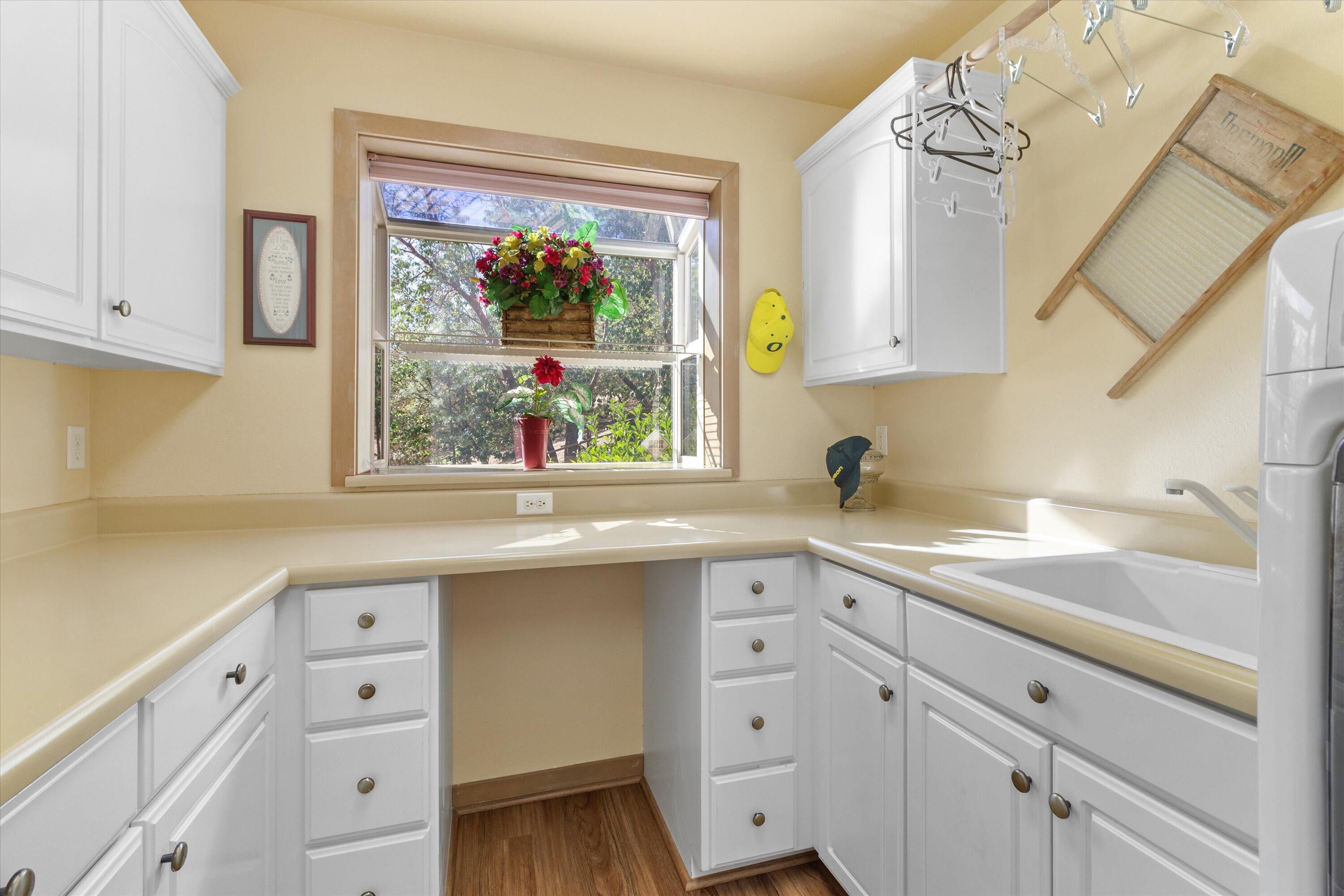 2801 Old Military Road Central Point, OR 97502 - Photo 20 of 49 a kitchen with cabinets and window