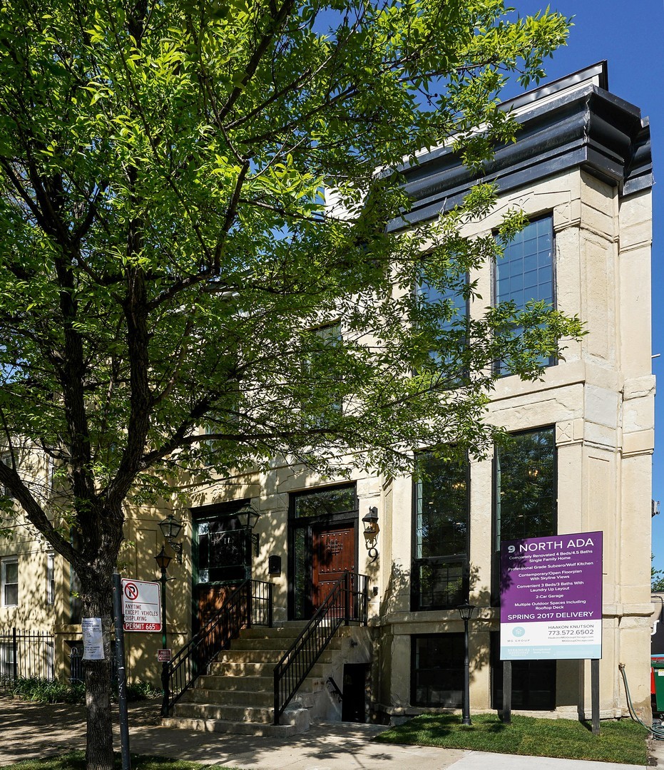 a view of a house with a tree