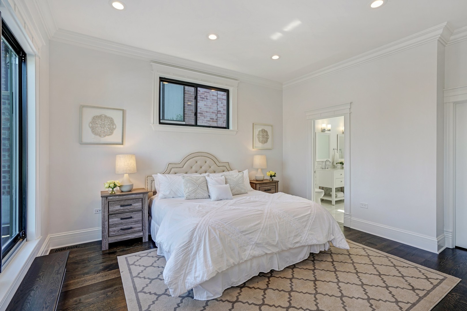 9 North Ada Street Chicago, IL 60607 - Photo 13 of 39 a bedroom with a bed and a window