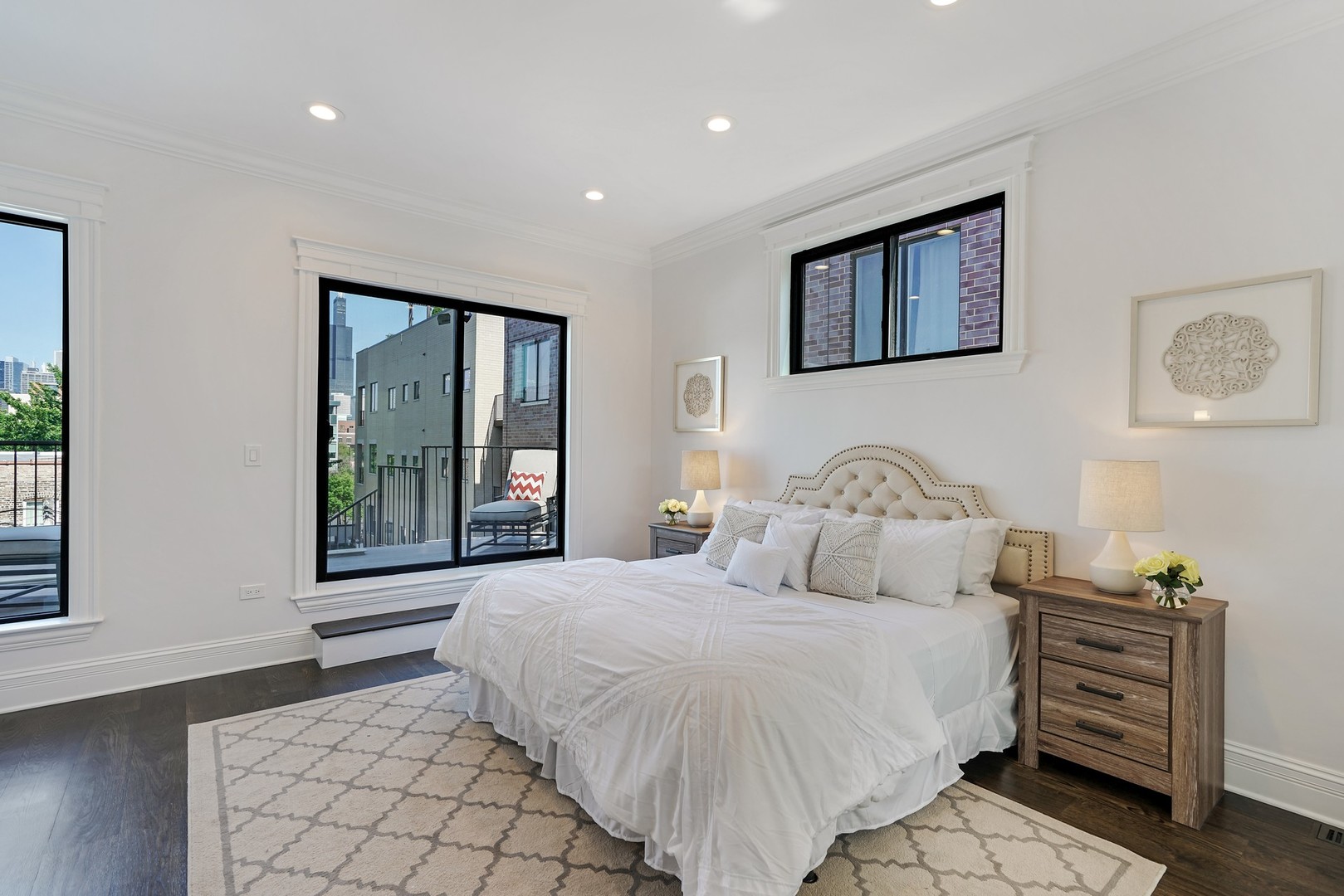 9 North Ada Street Chicago, IL 60607 - Photo 14 of 39 a bedroom with a bed and a large window