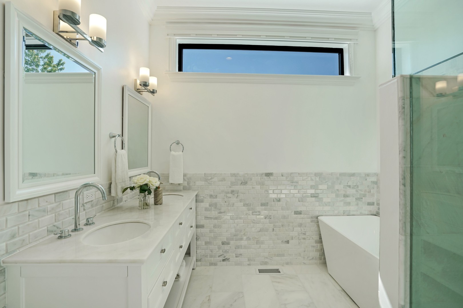 9 North Ada Street Chicago, IL 60607 - Photo 16 of 39 a bathroom with a sink a toilet and shower