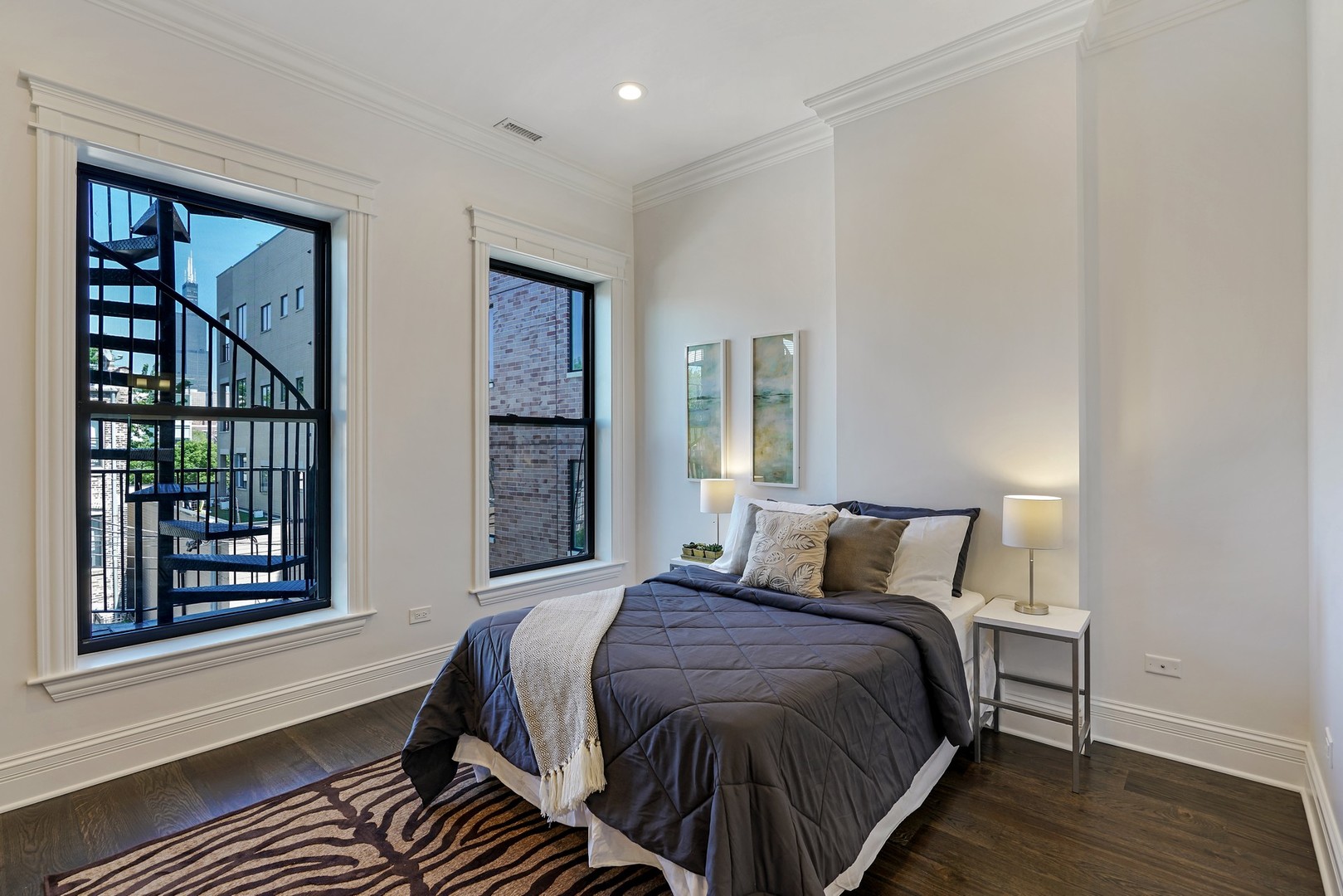 9 North Ada Street Chicago, IL 60607 - Photo 18 of 39 a bedroom with a bed and a window