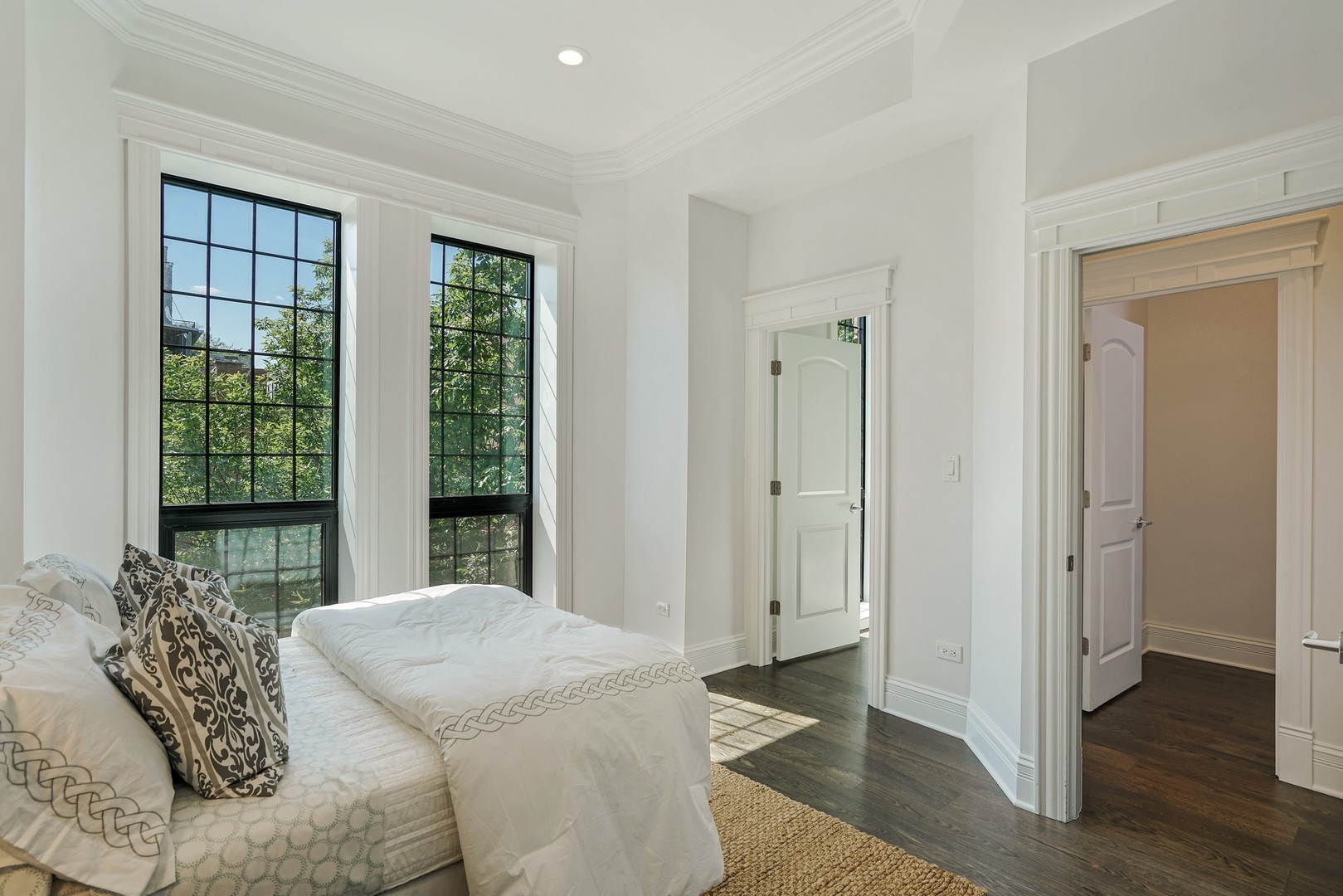 9 North Ada Street Chicago, IL 60607 - Photo 22 of 39 a bedroom with a bed and a window