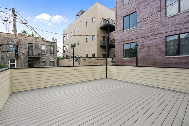 9 North Ada Street Chicago, IL 60607 - Photo 29 of 39 a view of building with door