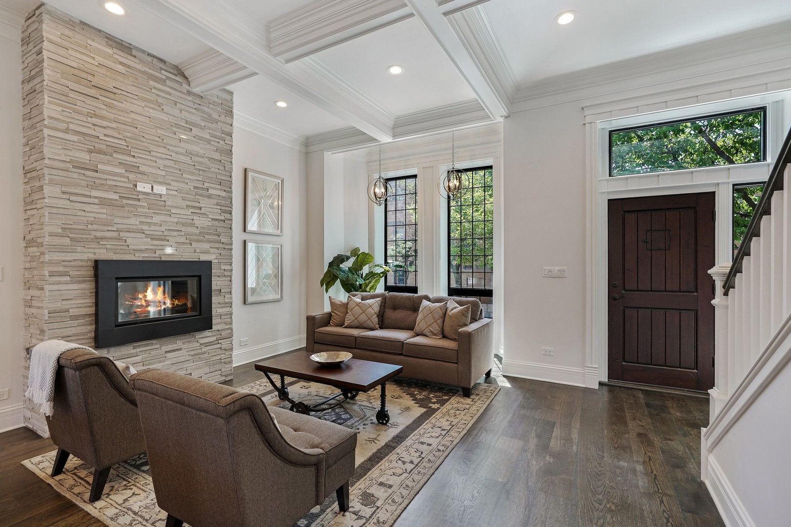 9 North Ada Street Chicago, IL 60607 - Photo 3 of 39 a living room with furniture and a fireplace