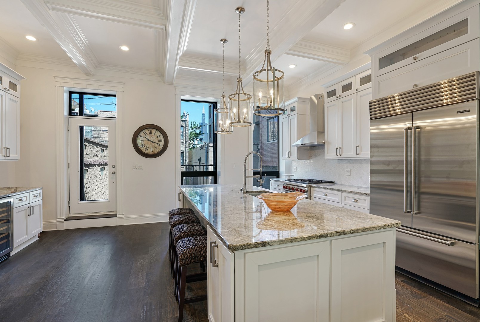 9 North Ada Street Chicago, IL 60607 - Photo 5 of 39 a kitchen with sink refrigerator and microwave