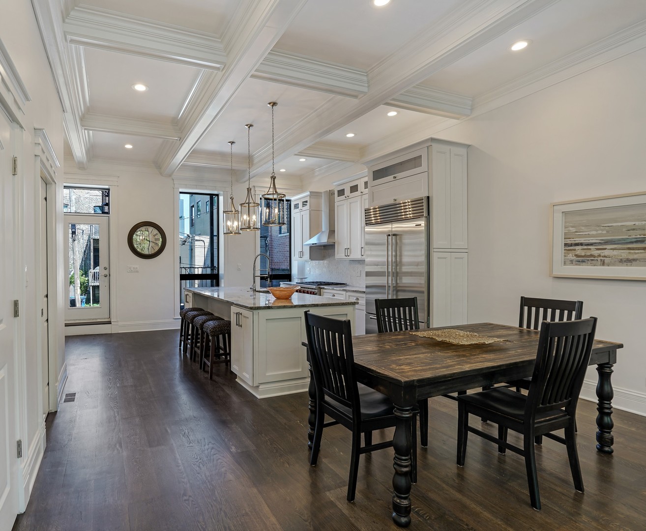 9 North Ada Street Chicago, IL 60607 - Photo 9 of 39 a kitchen with a table and chairs in it