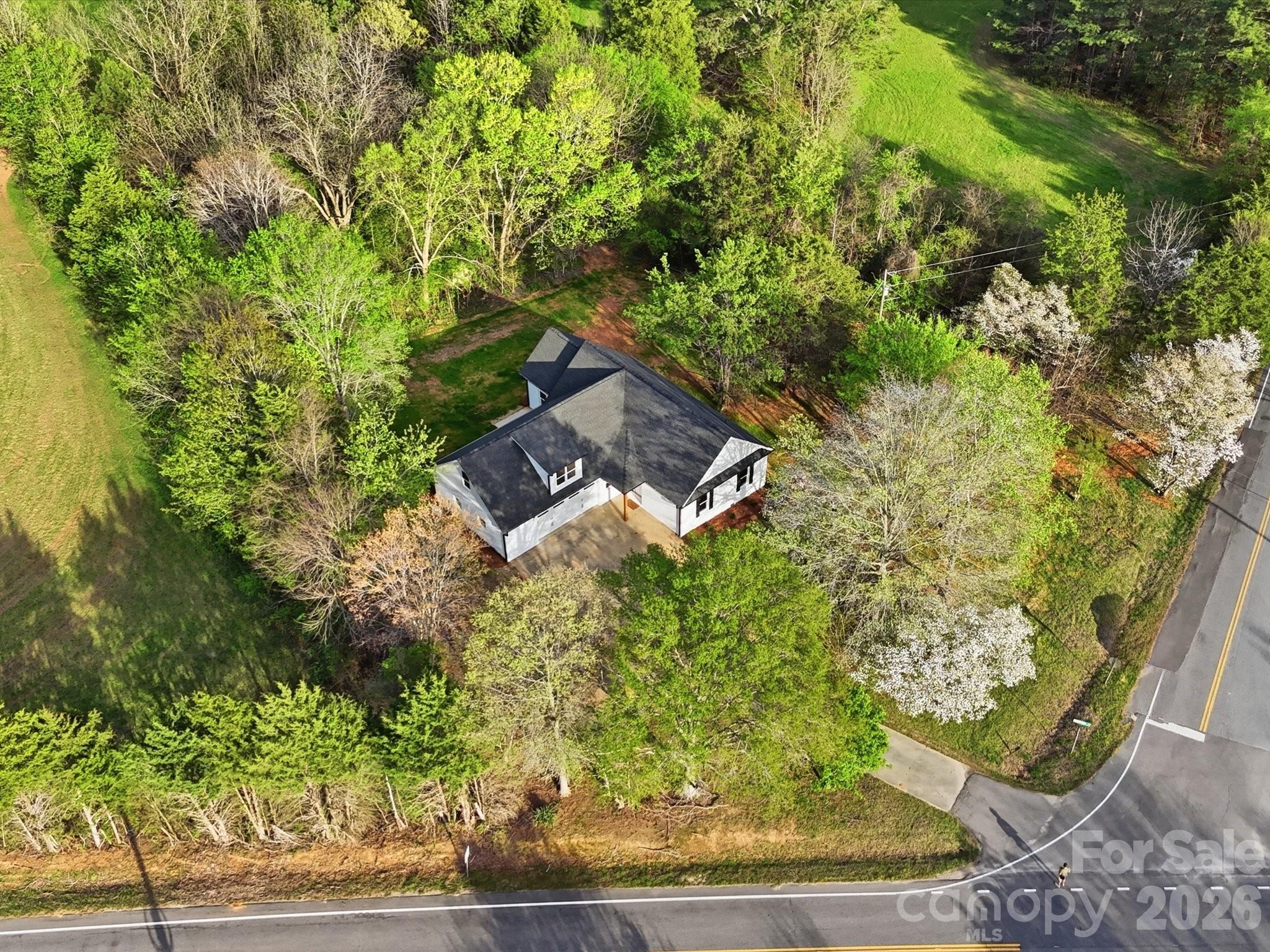 1491 Cedar Grove Road Clover, SC 29710 - Photo 40 of 48 a view of a wooden house with a yard