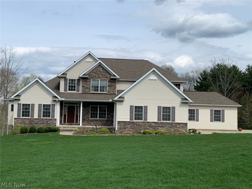 12395 Falcon Ridge Road Chesterland, OH 44026 - Photo 1 of 35 Welcome to 12395 Falcon Ridge Road, Sherman Forest, Chesterland, OH 44026! Custom Built 3,400+ SF Transitonal Colonial with First Floor Master Suite, Lower Level Walk Out, and So Many Special Features!