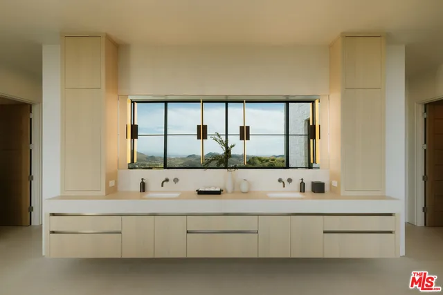 a view of a living room with a large window