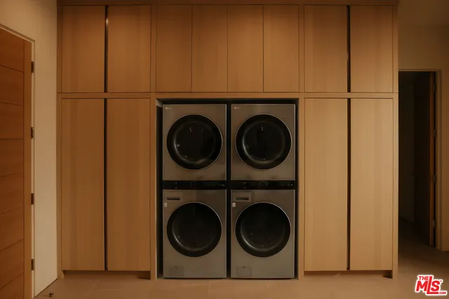 a view of a living room and kitchen