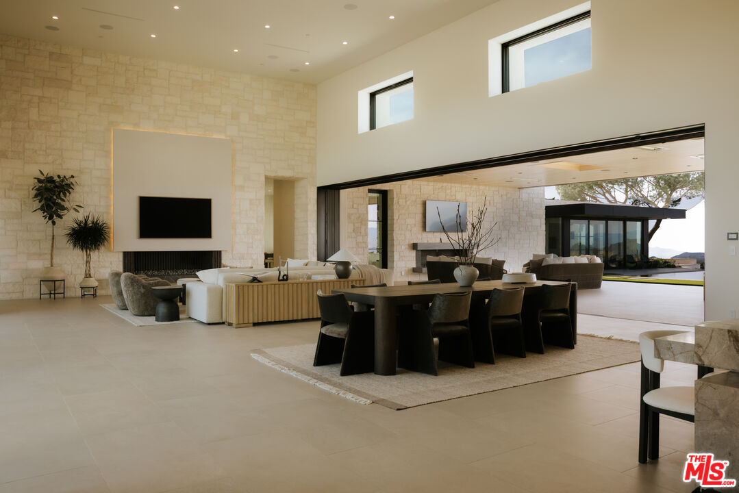 2551 White Stallion Road Thousand Oaks, CA 91361 - Photo 7 of 48 a living room with furniture flat screen tv and couches