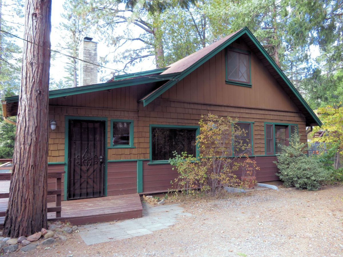 25225 Palomar Road Idyllwild, CA 92549 - Photo 2 of 17 a front view of a house with garden