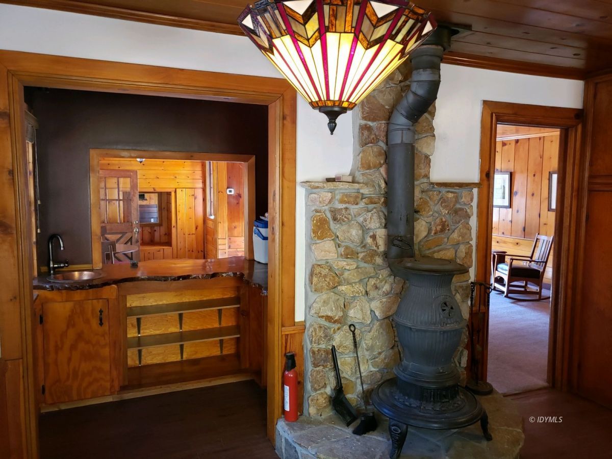 25225 Palomar Road Idyllwild, CA 92549 - Photo 4 of 17 a view of living room with furniture and a fireplace