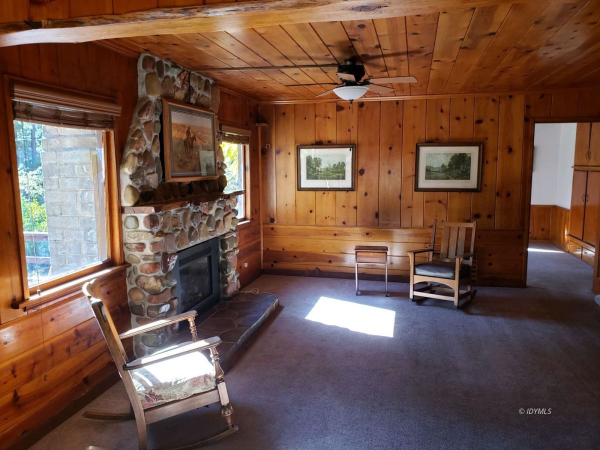 25225 Palomar Road Idyllwild, CA 92549 - Photo 6 of 17 a living room with furniture and a flat screen tv