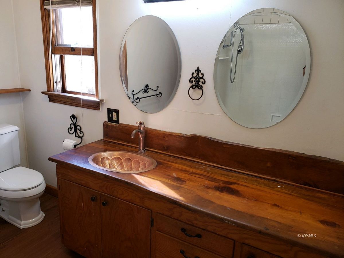25225 Palomar Road Idyllwild, CA 92549 - Photo 9 of 17 a bathroom with a sink and a mirror