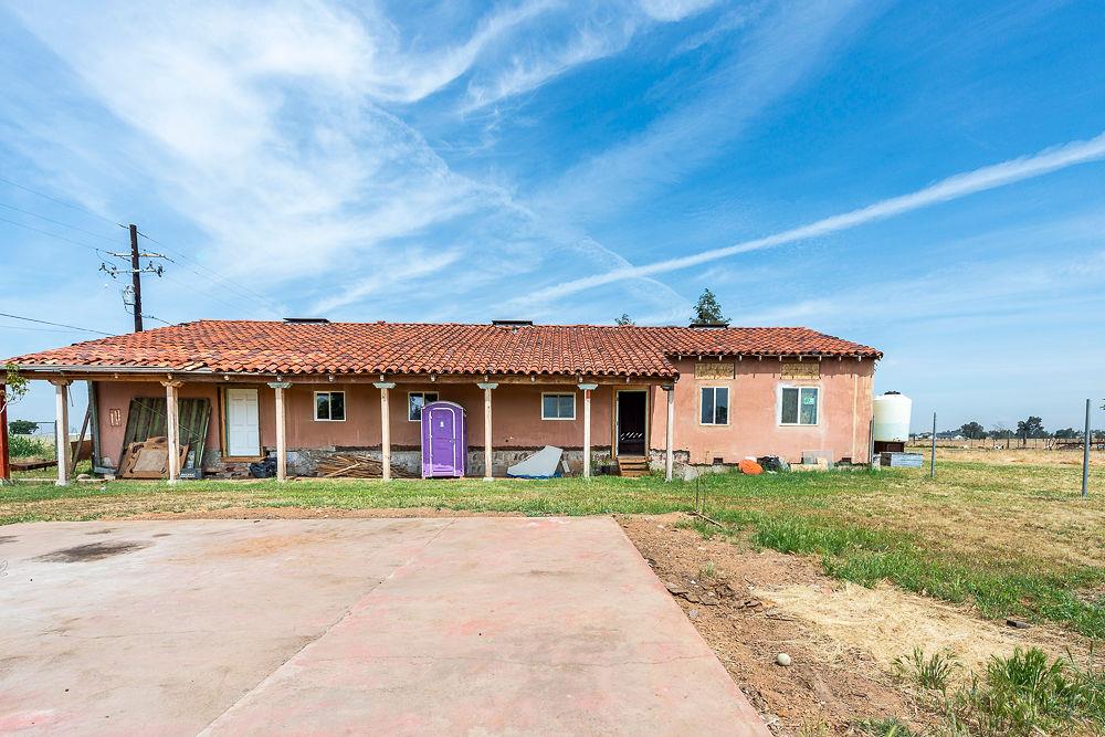 2803 Sharon Boulevard Madera, CA 93638 - Photo 1 of 29 a front view of a house with a yard