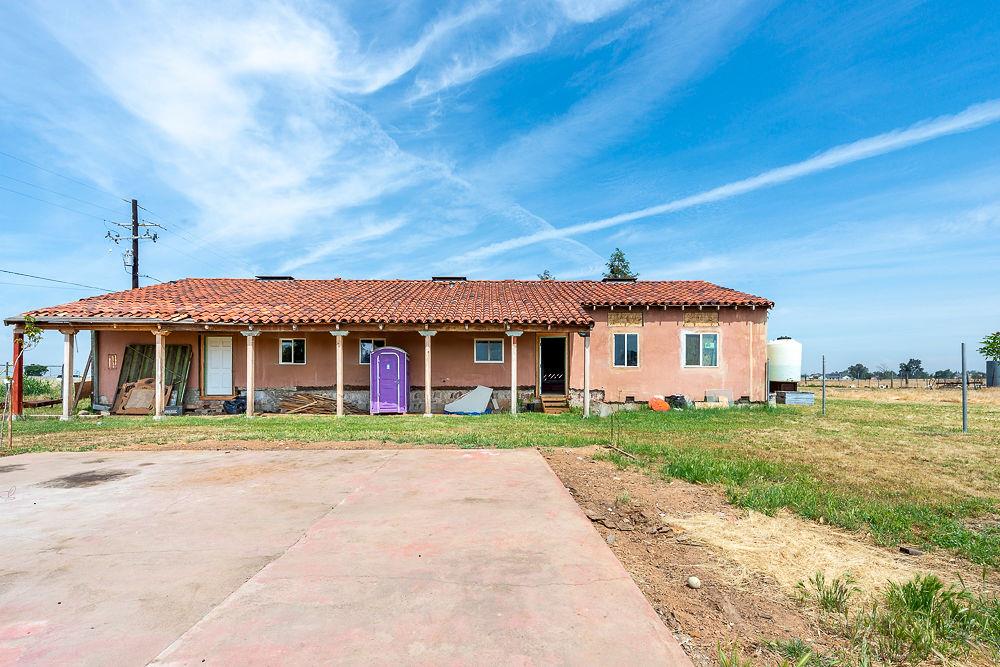 2803 Sharon Boulevard Madera, CA 93638 - Photo 20 of 29 a front view of a house with a yard