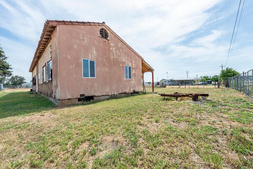 2803 Sharon Boulevard Madera, CA 93638 - Photo 23 of 29 a backyard of a house with lots of green space