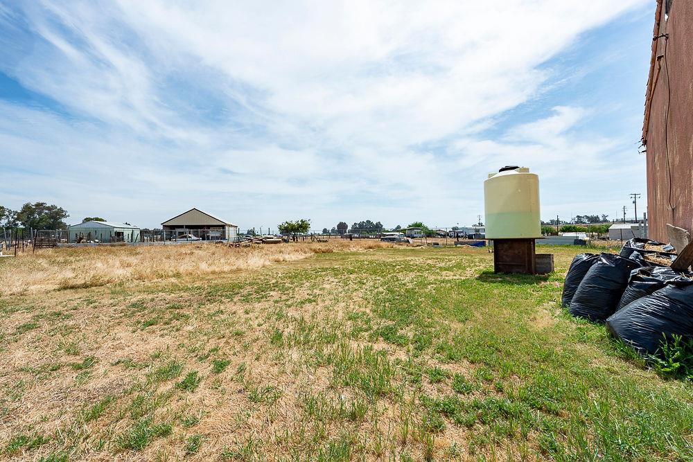2803 Sharon Boulevard Madera, CA 93638 - Photo 26 of 29 a view of a lake with houses in the back