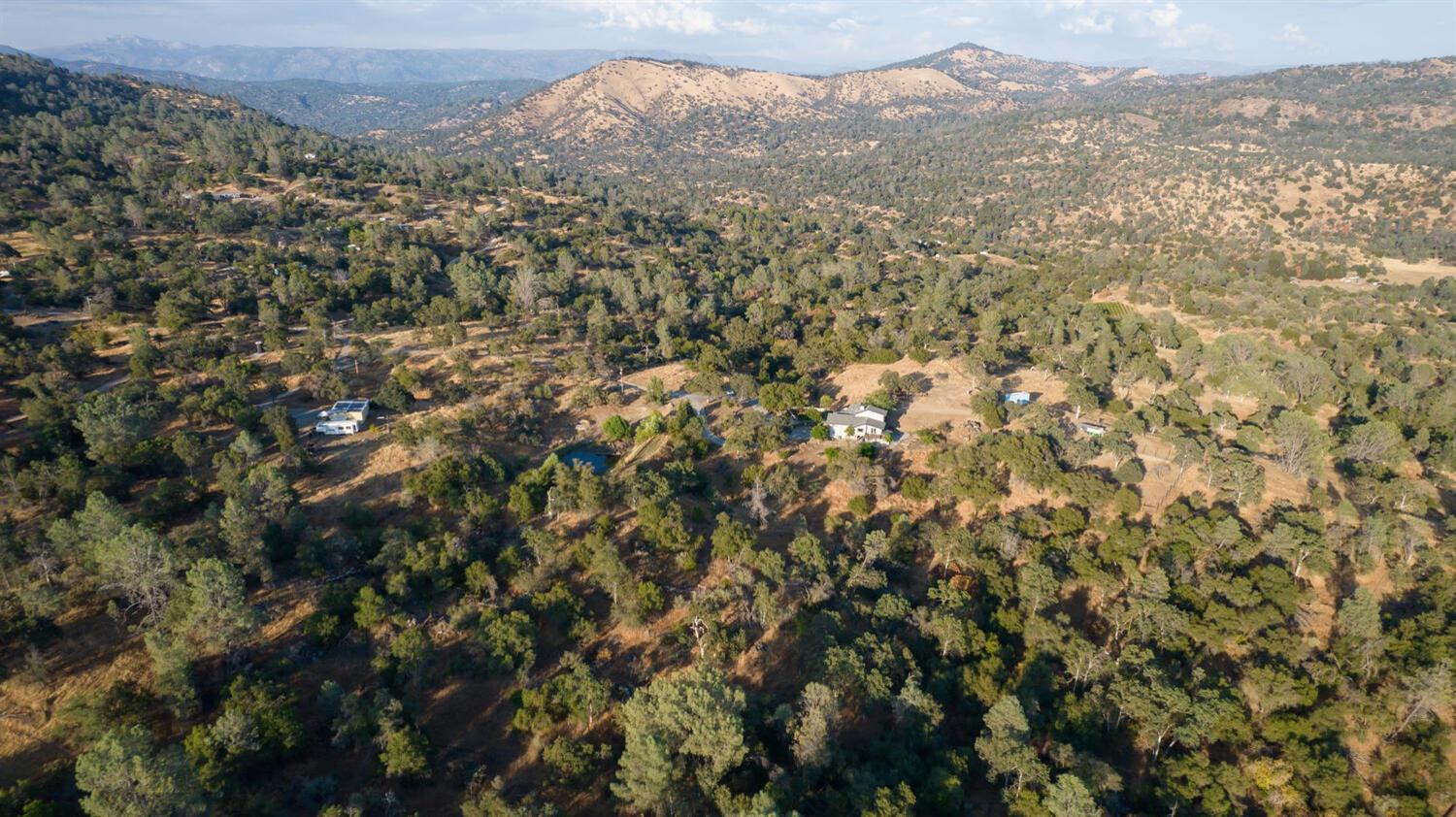 49376 House Ranch Road O'Neals, CA 93645 - Photo 51 of 70 a view of a city with mountains in the background
