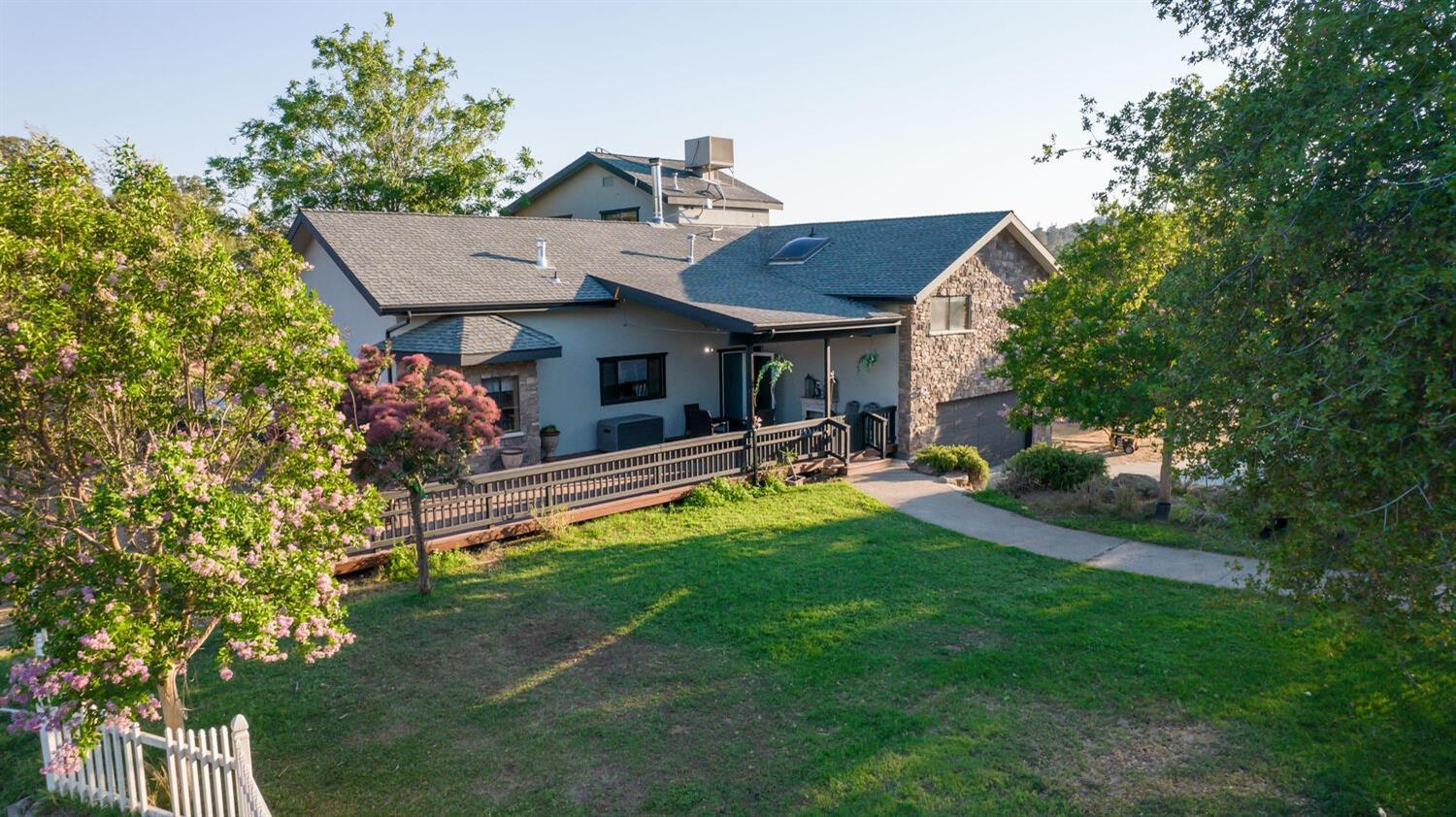 49376 House Ranch Road O'Neals, CA 93645 - Photo 67 of 70 a view of a house with backyard tub and garden