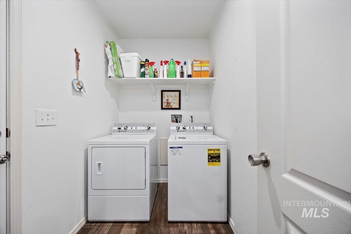 121 Sunset Drive North Hagerman, ID 83332 - Photo 22 of 31 Washroom featuring dark wood-type flooring and washer and dryer