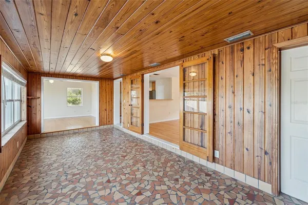 a view of an empty room with a window