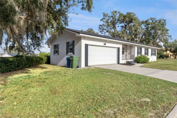 front view of a house with a yard