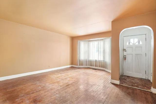 an empty room with windows