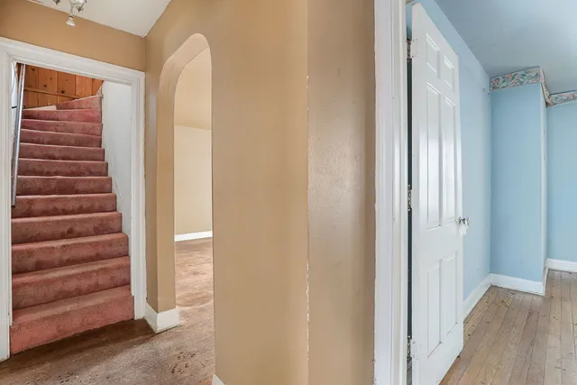 a view of front door with stairs