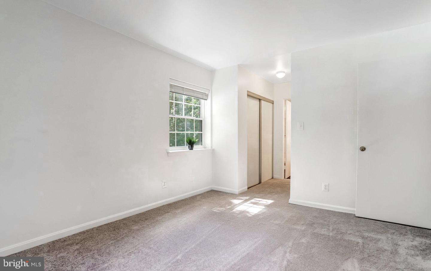 5912 Cove Landing Road, Unit 301 Burke, VA 22015 - Photo 15 of 30 an empty room with windows