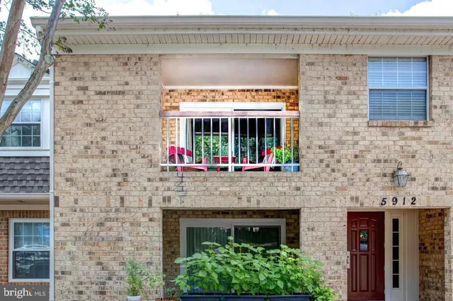 a view of house with outdoor space and porch