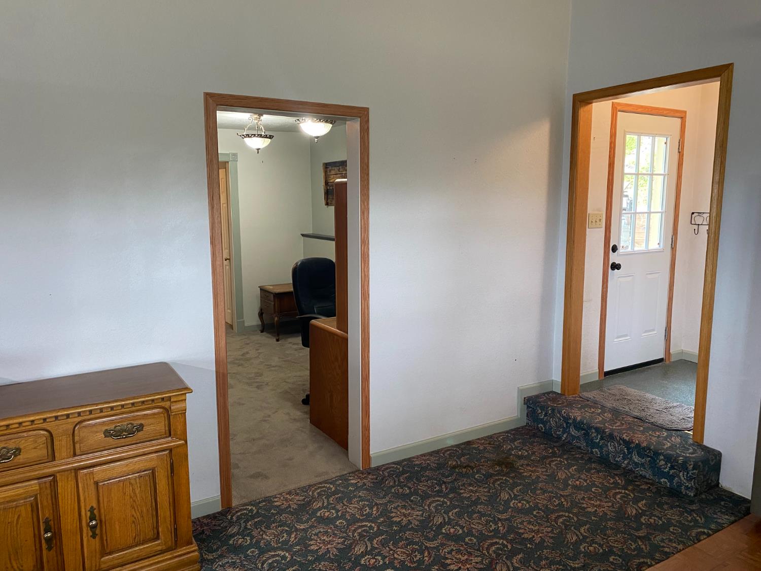 5021 Banbury Cross Road Shingle Springs, CA 95682 - Photo 27 of 92 View from kitchen toward Office/Library/4th bdrm and mud room with side door.