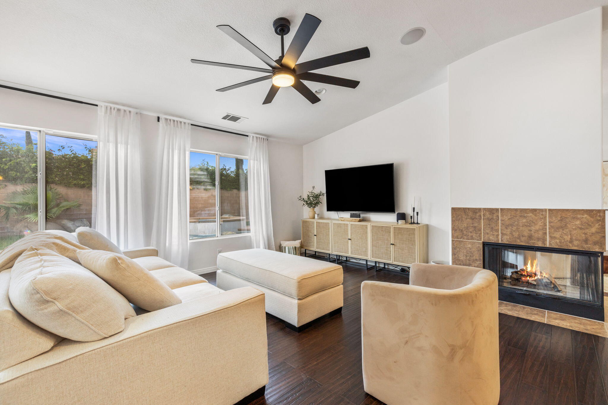 80543 Philadelphia Avenue Indio, CA 92201 - Photo 12 of 46 a living room with furniture and a flat screen tv