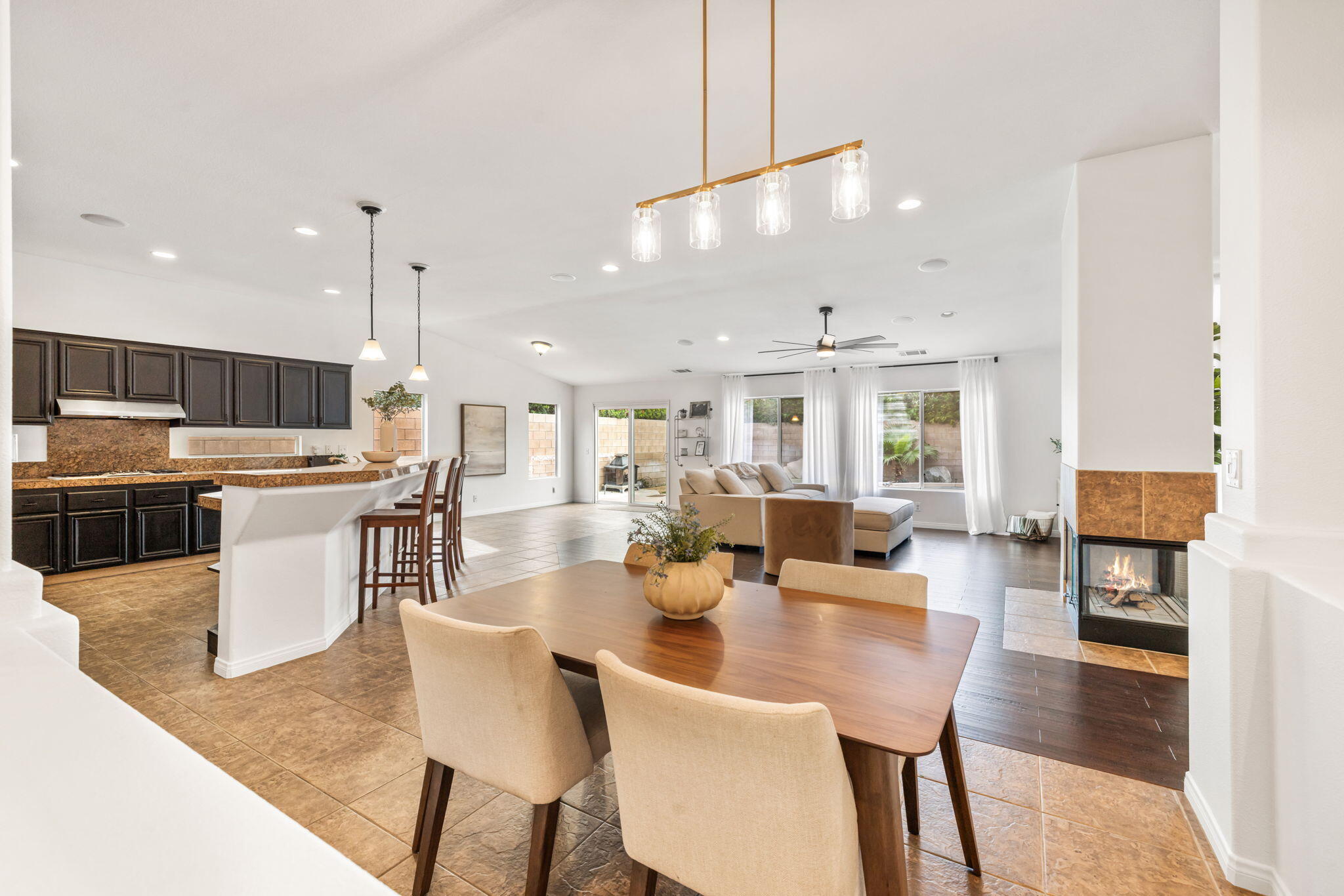 80543 Philadelphia Avenue Indio, CA 92201 - Photo 14 of 46 a large kitchen with a table and chairs