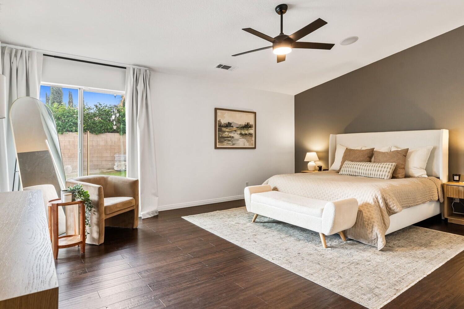 80543 Philadelphia Avenue Indio, CA 92201 - Photo 19 of 46 a bedroom with a bed and a couch