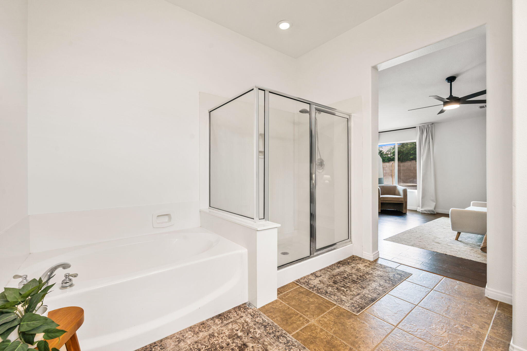 80543 Philadelphia Avenue Indio, CA 92201 - Photo 24 of 46 a bathroom with a tub shower and a sink
