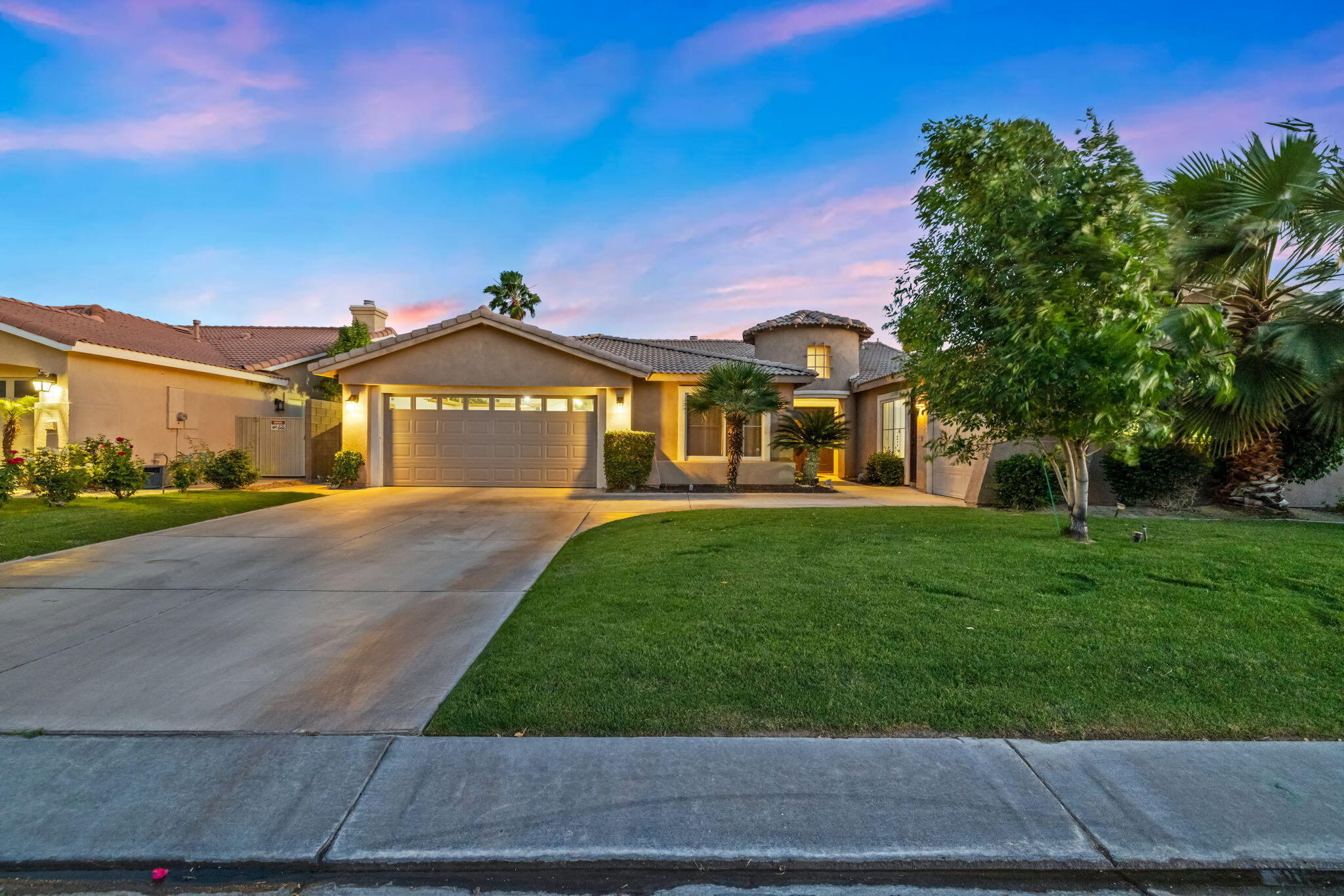 80543 Philadelphia Avenue Indio, CA 92201 - Photo 3 of 46 a view of outdoor space with garden