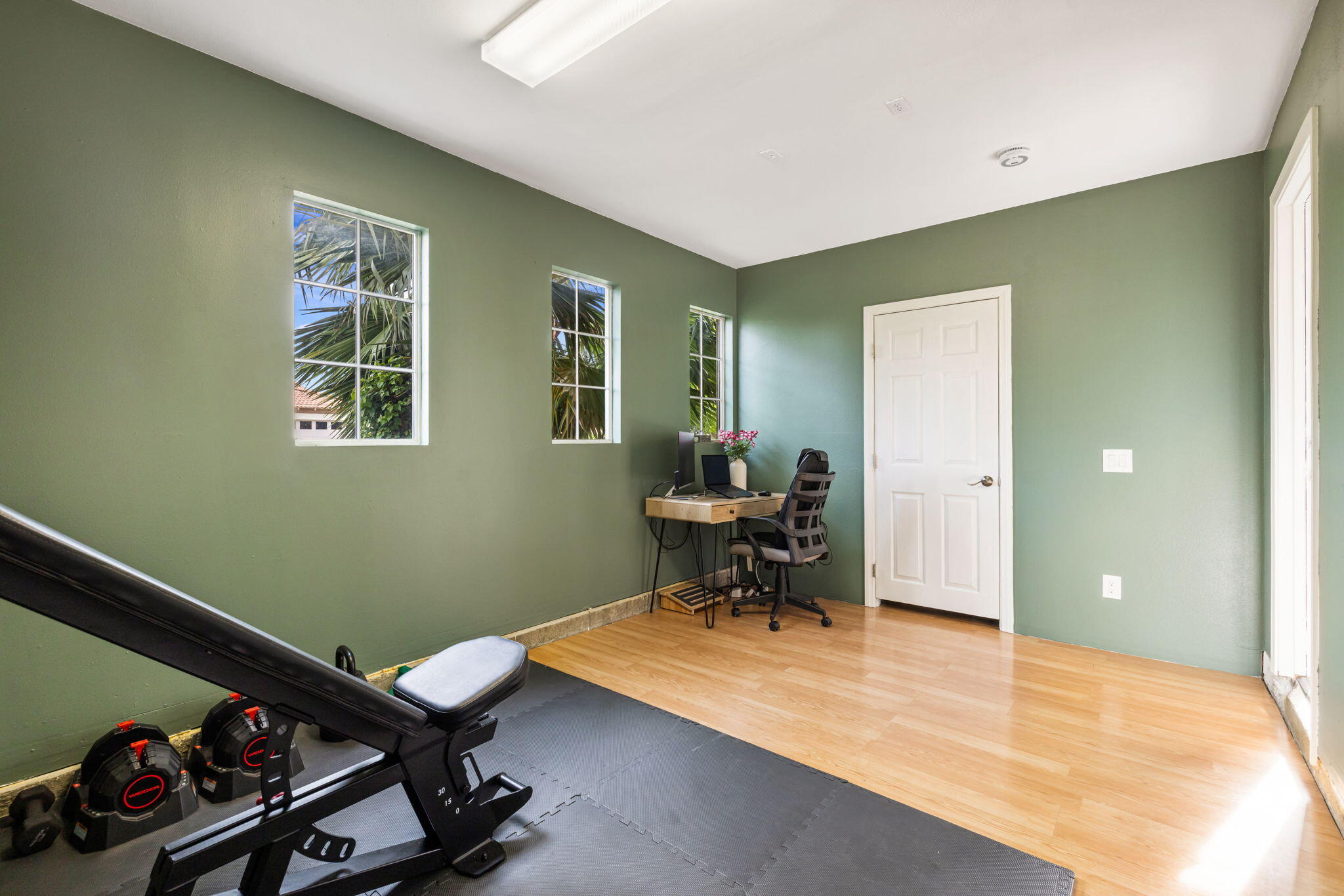 80543 Philadelphia Avenue Indio, CA 92201 - Photo 34 of 46 a view of a workspace with furniture and a window