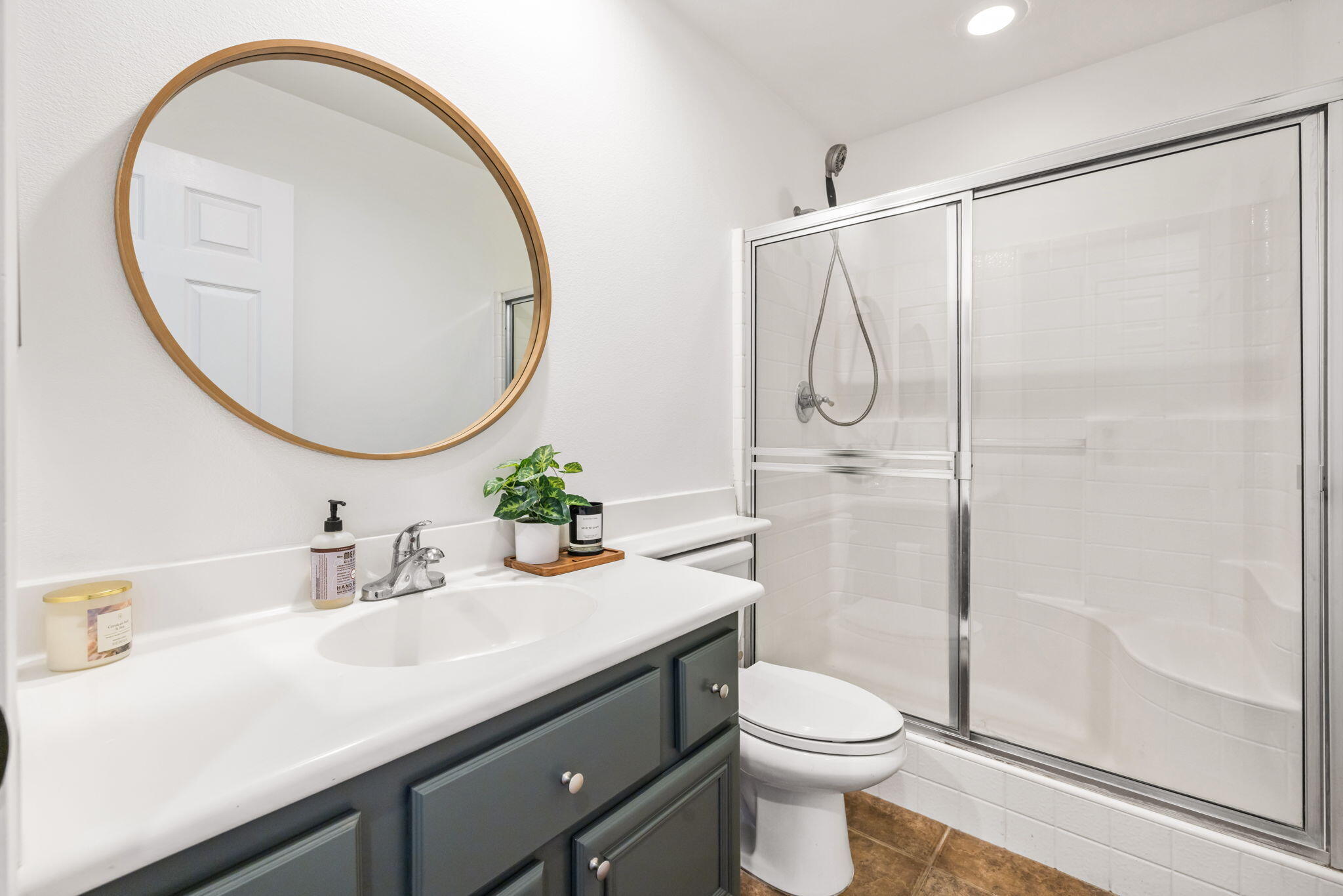 80543 Philadelphia Avenue Indio, CA 92201 - Photo 35 of 46 a bathroom with a sink toilet and a mirror