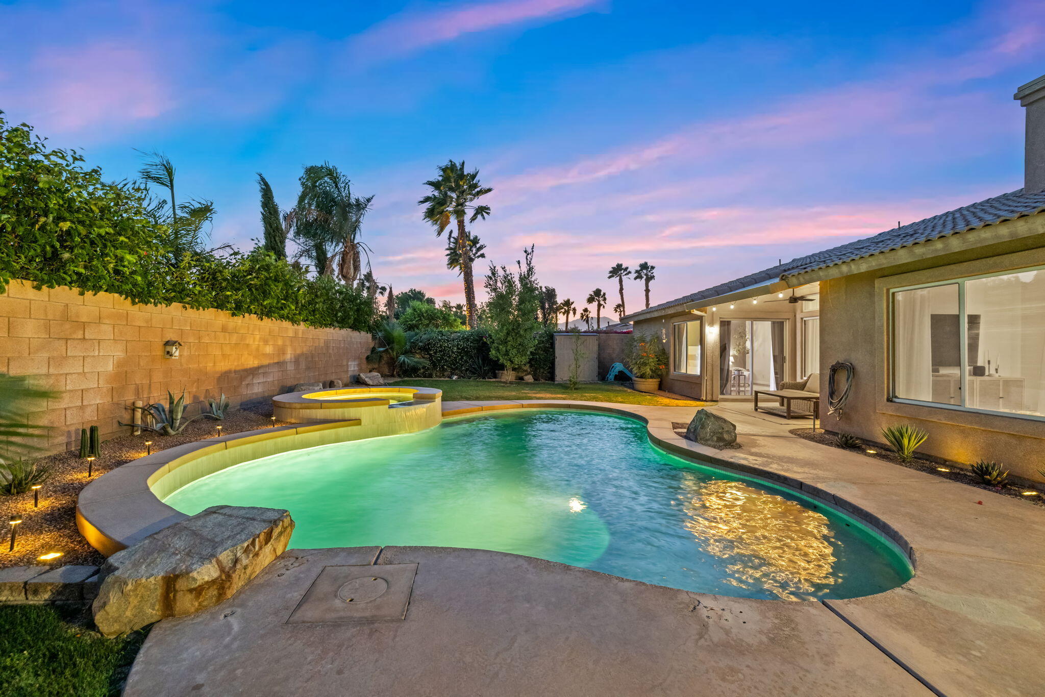 80543 Philadelphia Avenue Indio, CA 92201 - Photo 41 of 46 swimming pool with outdoor seating and yard