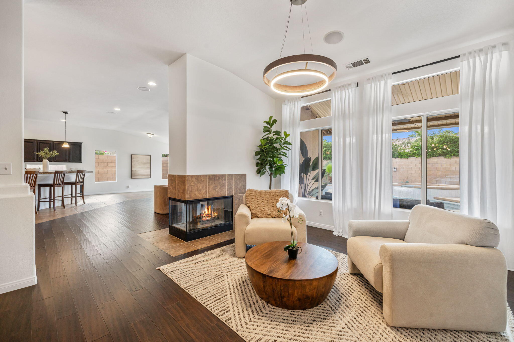 80543 Philadelphia Avenue Indio, CA 92201 - Photo 7 of 46 a living room with furniture and a large window