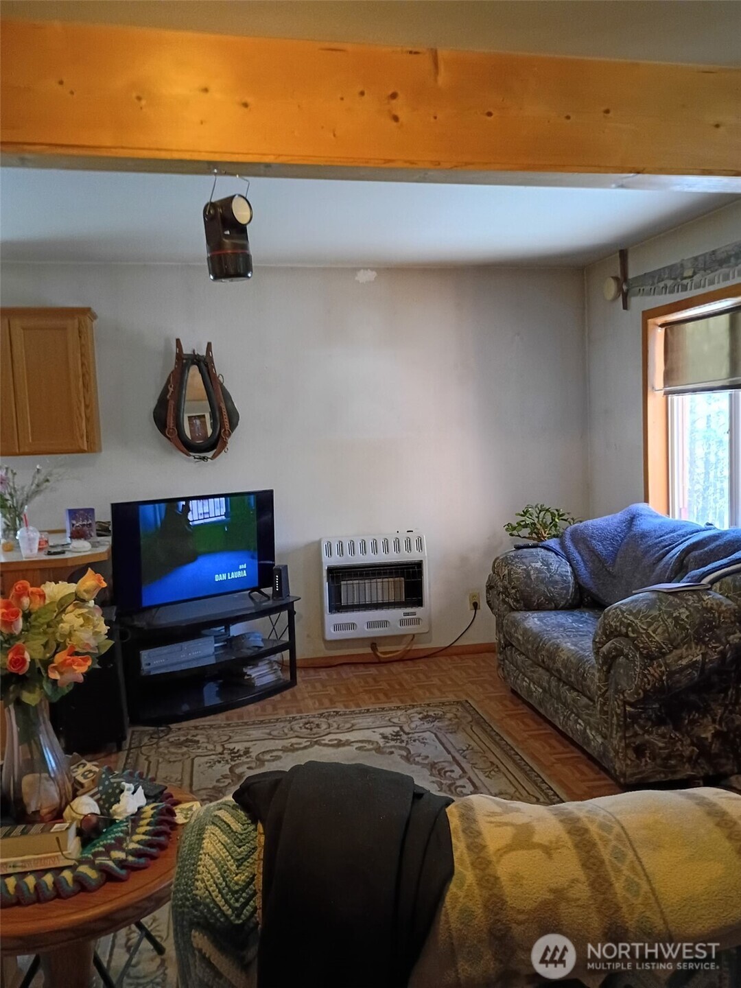12 Caribou Road Tonasket, WA 98855 - Photo 7 of 37 a living room with furniture and a fireplace